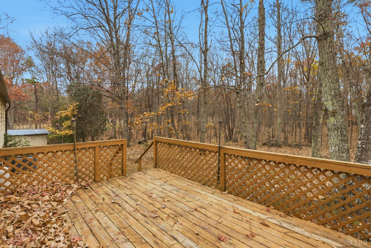 969 Hawkins Road Evington, VA 24550 - Photo 31 of 40 a view of balcony with wooden floor and fence