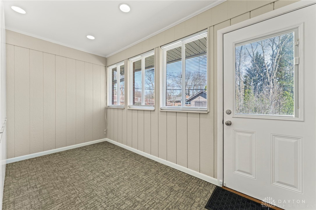 2247 East Whipp Road Dayton, OH 45440 - Photo 37 of 52 This bright sunroom features multiple windows, offering abundant natural light and an inviting atmosphere.