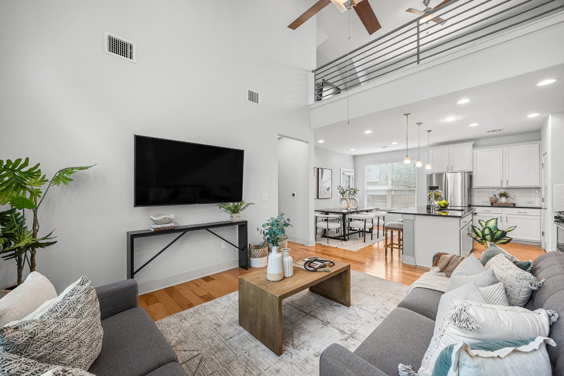 2315 Capulet Street Austin, TX 78741 - Photo 5 of 33 a living room with furniture and a flat screen tv