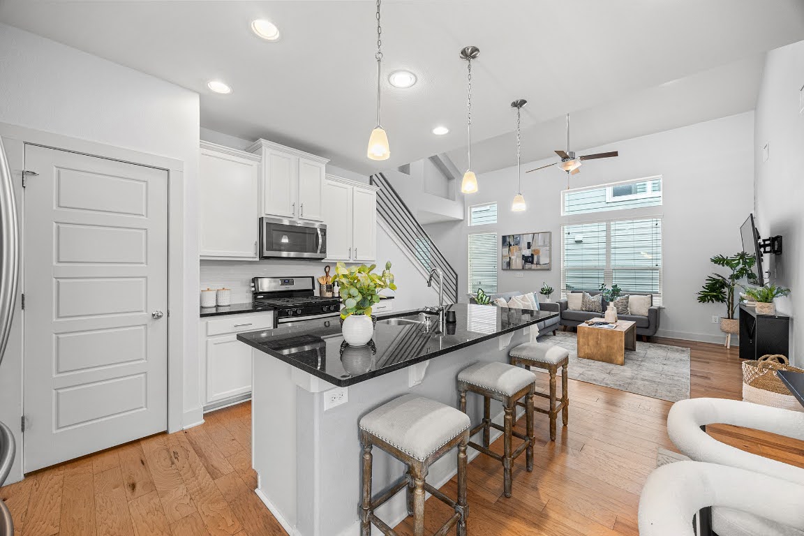 2315 Capulet Street Austin, TX 78741 - Photo 10 of 33 a living room with furniture and wooden floor