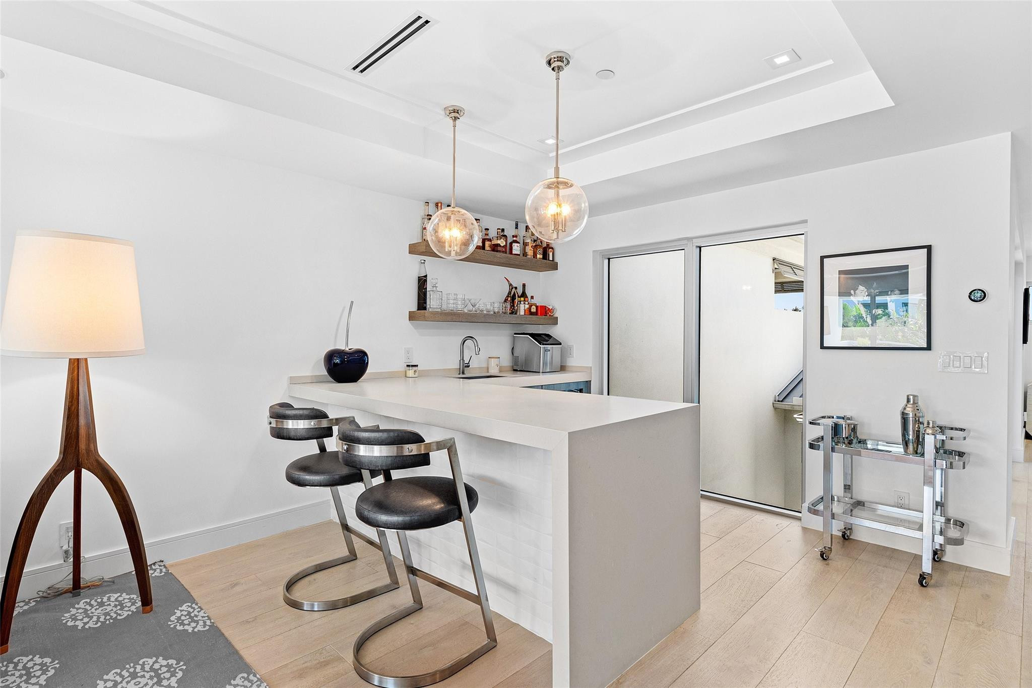 1022 Langer Way Delray Beach, FL 33483 - Photo 21 of 33 a view of a workspace with furniture and a table