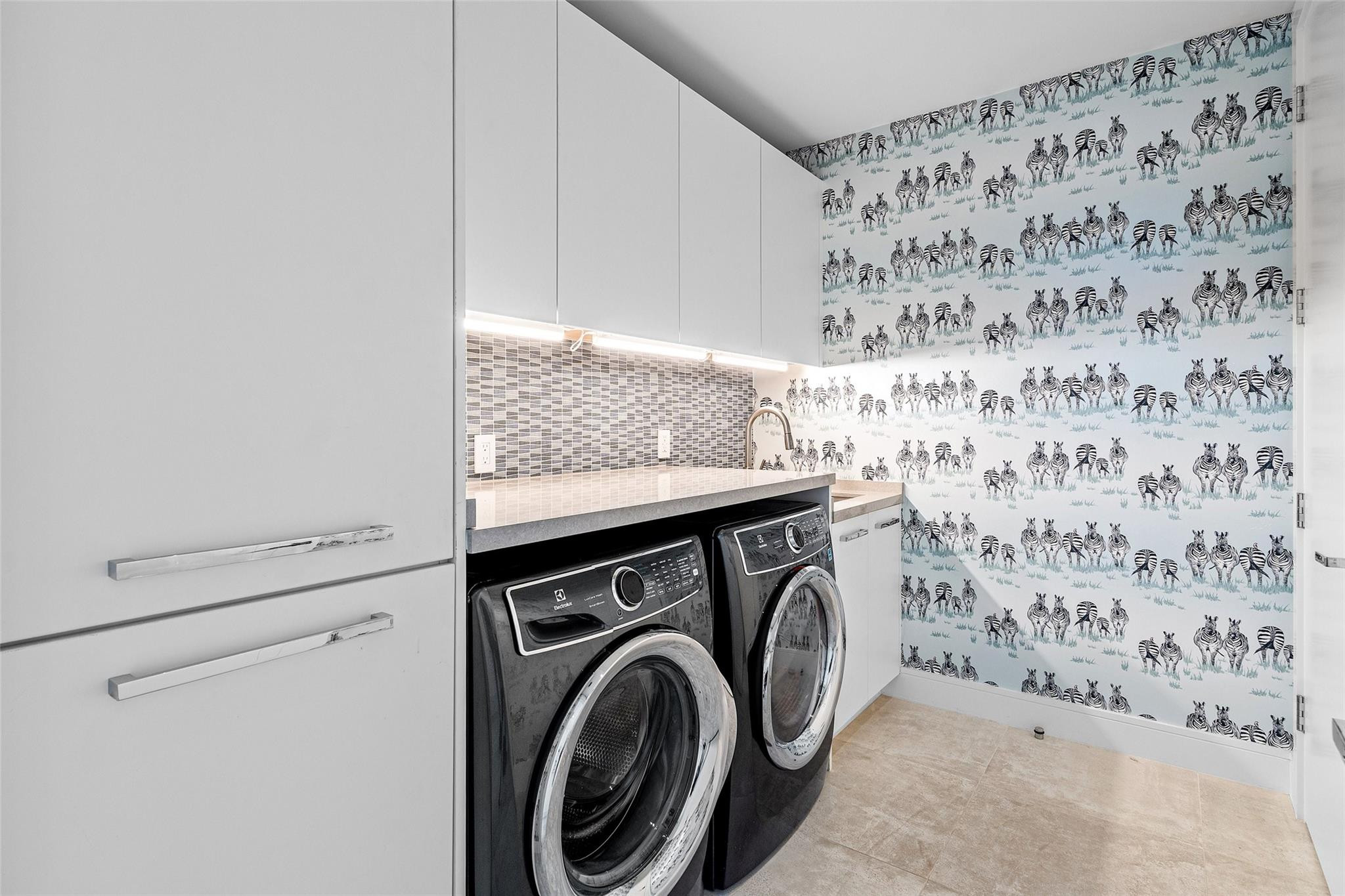 1022 Langer Way Delray Beach, FL 33483 - Photo 29 of 38 a utility room with dryer and washer