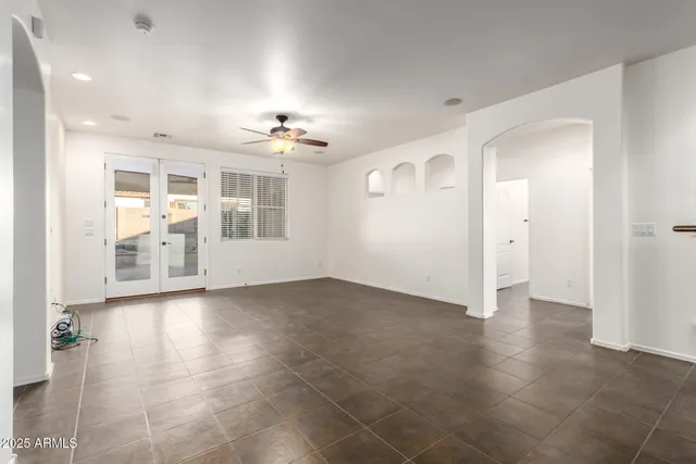 a view of a kitchen with a sink and a window