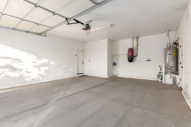 a view of a room with wooden floor and a yard