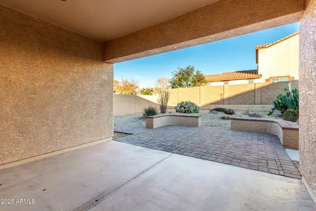 a view of a backyard of the house