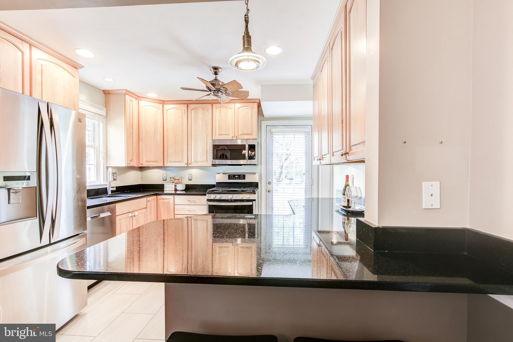 9200 Sudbury Road Silver Spring, MD 20901 - Photo 9 of 34 Kitchen with counter seating