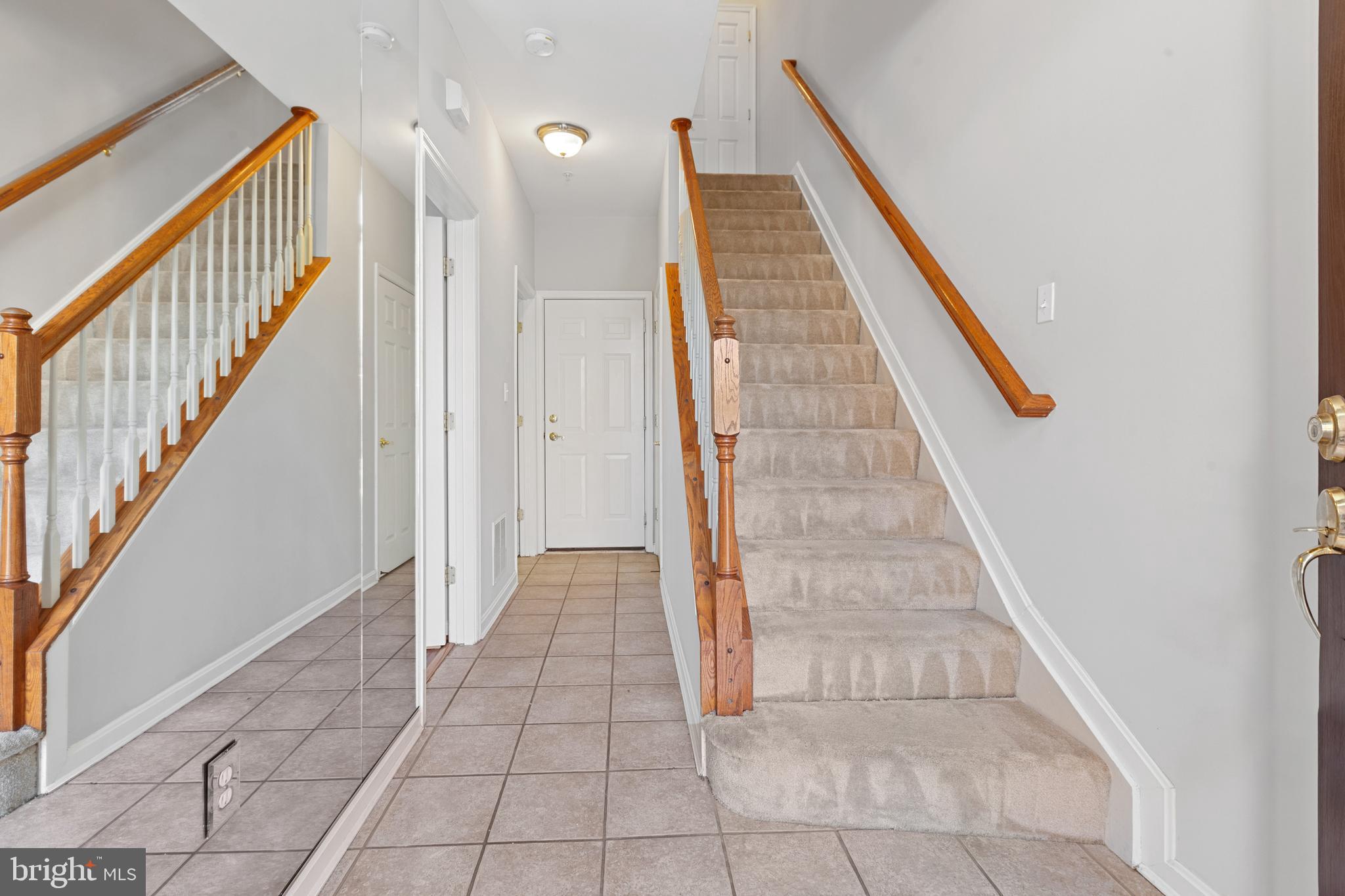 2319 Boston Street, Unit 4 Baltimore, MD 21224 - Photo 4 of 56 Foyer w/ ceramic tile & interior access to garage