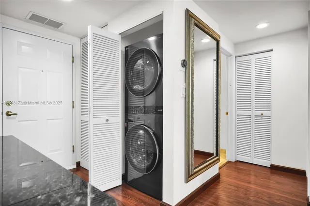 a view of livingroom with washer and dryer