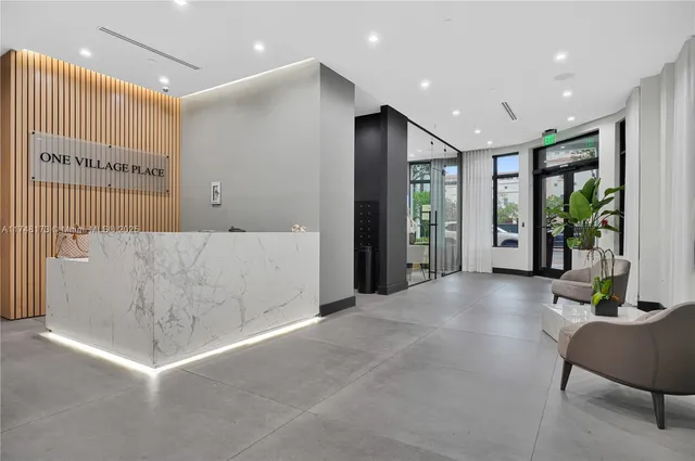 a view of livingroom with furniture and windows