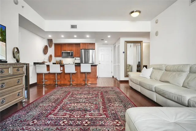 a living room with furniture and a couch
