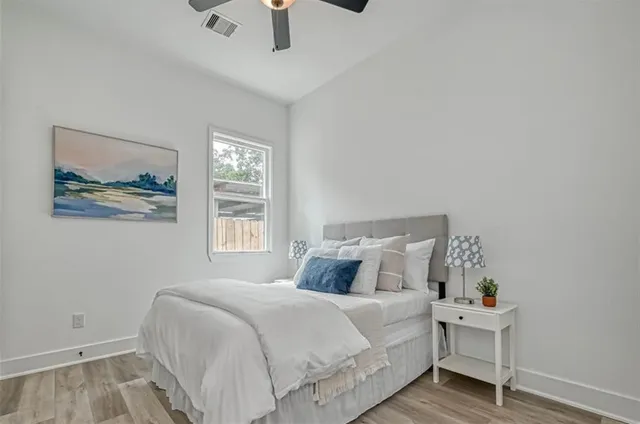 a bathroom with a double vanity sink mirror double and toilet