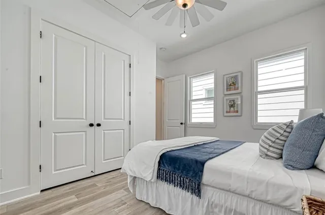 a kitchen with cabinets stainless steel appliances and sink