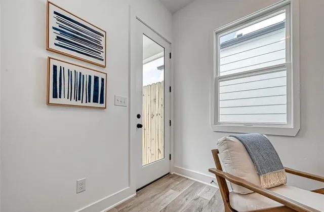 a kitchen with stainless steel appliances granite countertop sink stove top oven and cabinets