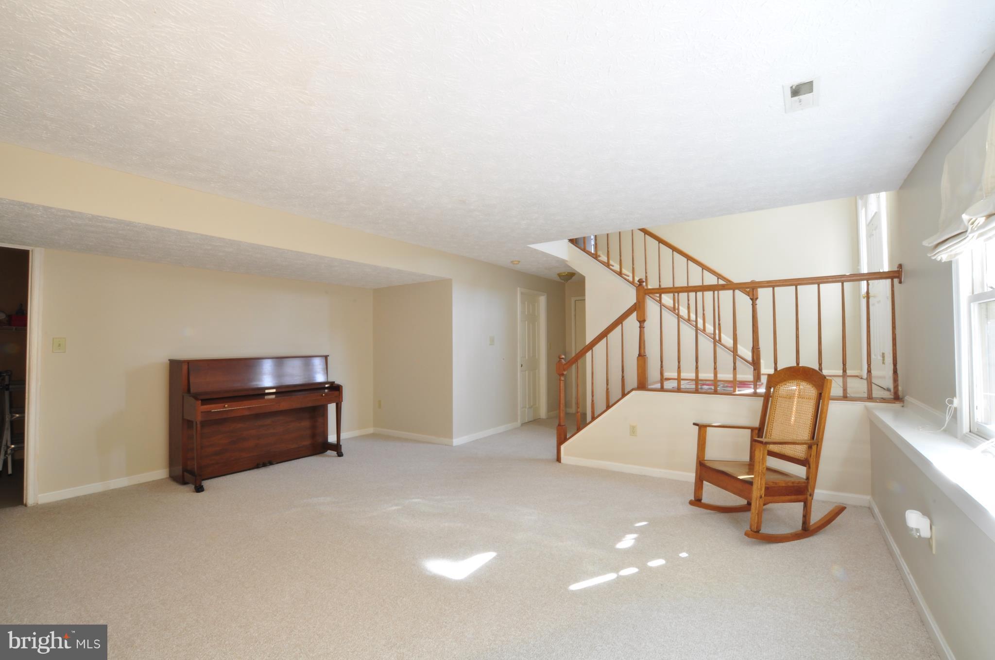 6593 Edgewood Road New Market, MD 21774 - Photo 11 of 19 Family Room Access to Utility Room and Garage