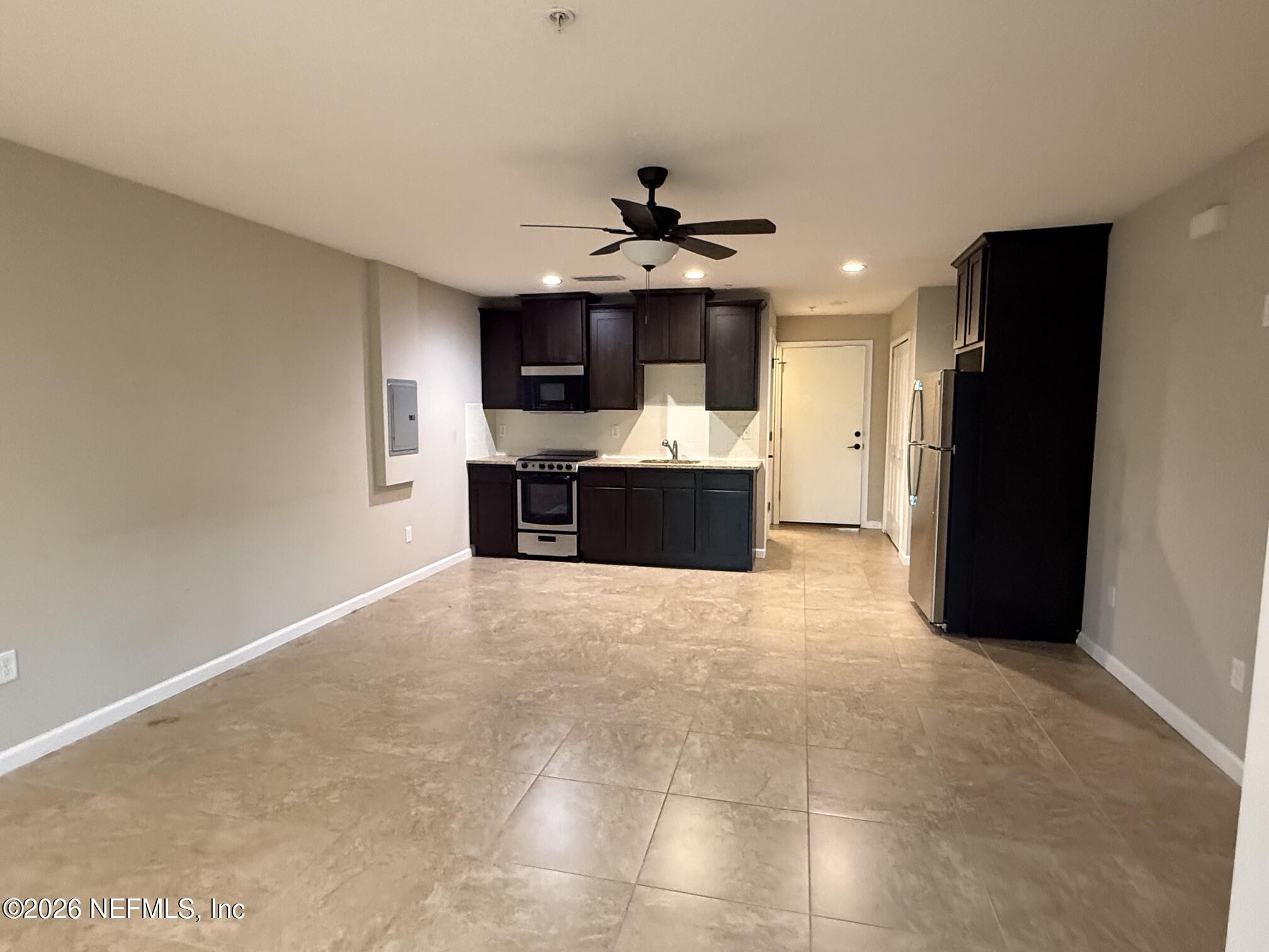 3145 Ravines Road, Unit 3422 Middleburg, FL 32068 - Photo 4 of 8 living/kitchen