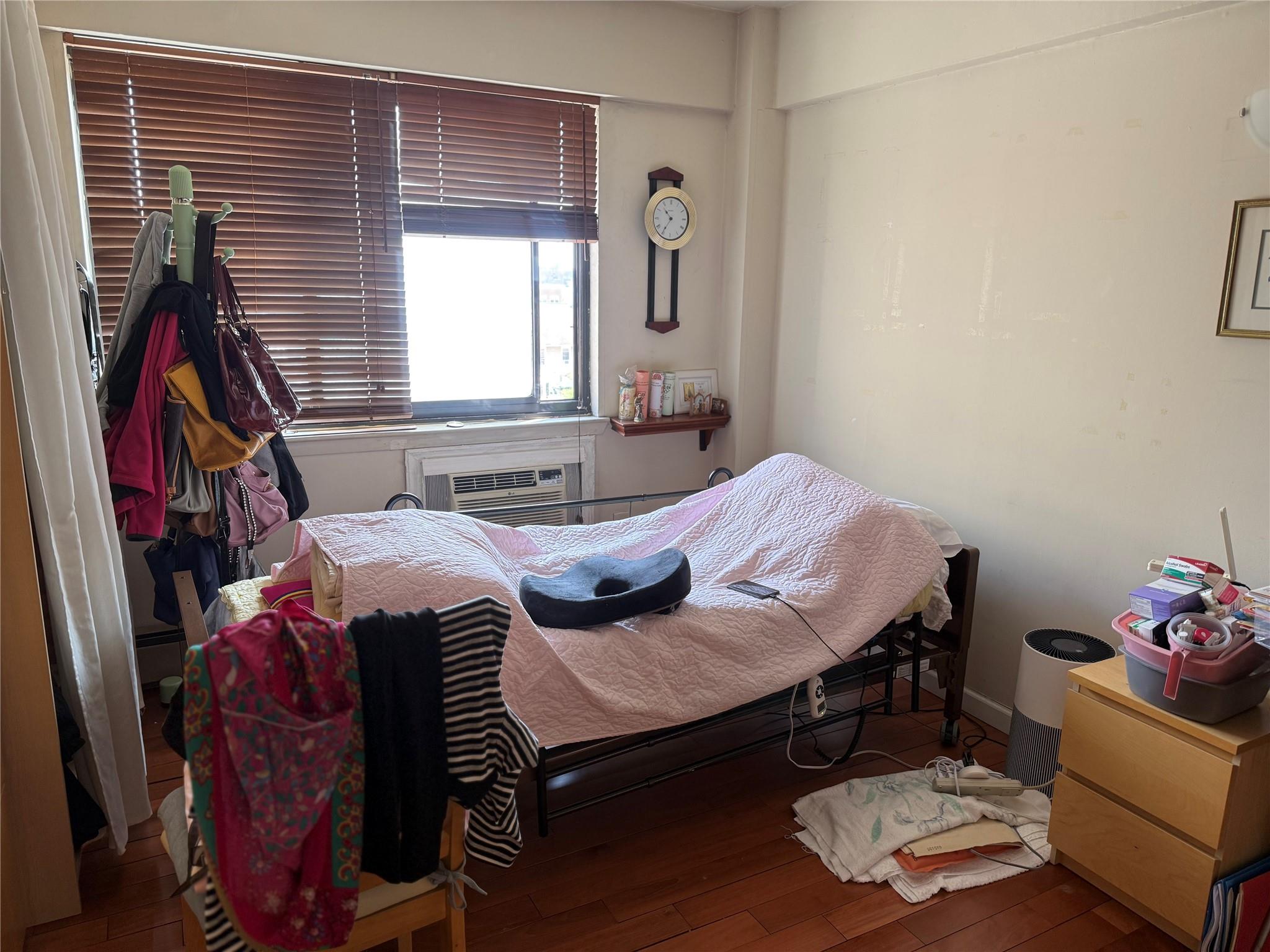 81-09 41st Avenue, Unit 5B Queens, NY 11373 - Photo 9 of 25 Bedroom with hardwood / wood-style floors.