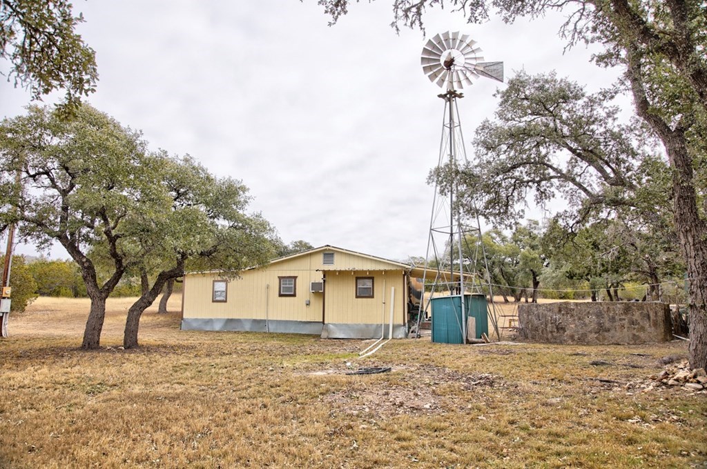 180 Bee Hive Road Hunt, TX 78024 - Photo 22 of 60 a front view of a house with a yard