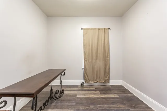 a view of room with stairs and a window