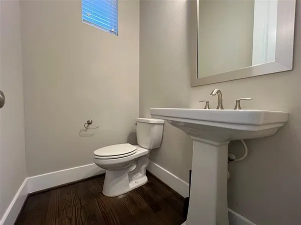 a bathroom with a sink a mirror and a bathtub