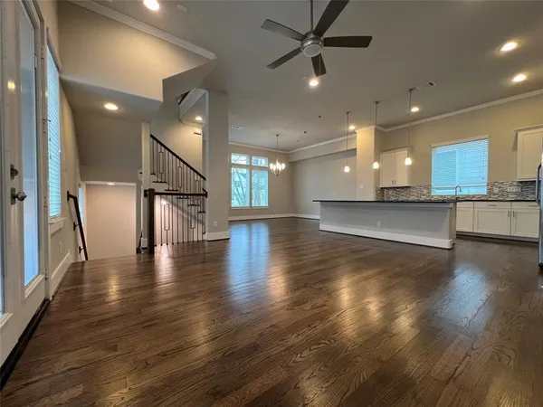 a kitchen with stainless steel appliances granite countertop a stove and a refrigerator