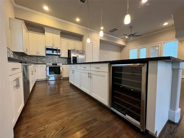 a bathroom with a sink toilet and a mirror