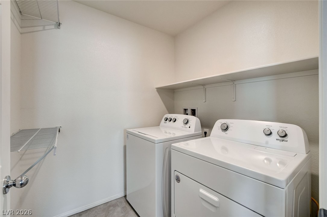 484 Filaree Place Henderson, NV 89015 - Photo 54 of 71 This dedicated laundry space simplifies chores with a convenient washer and dryer setup and integrated shelving.