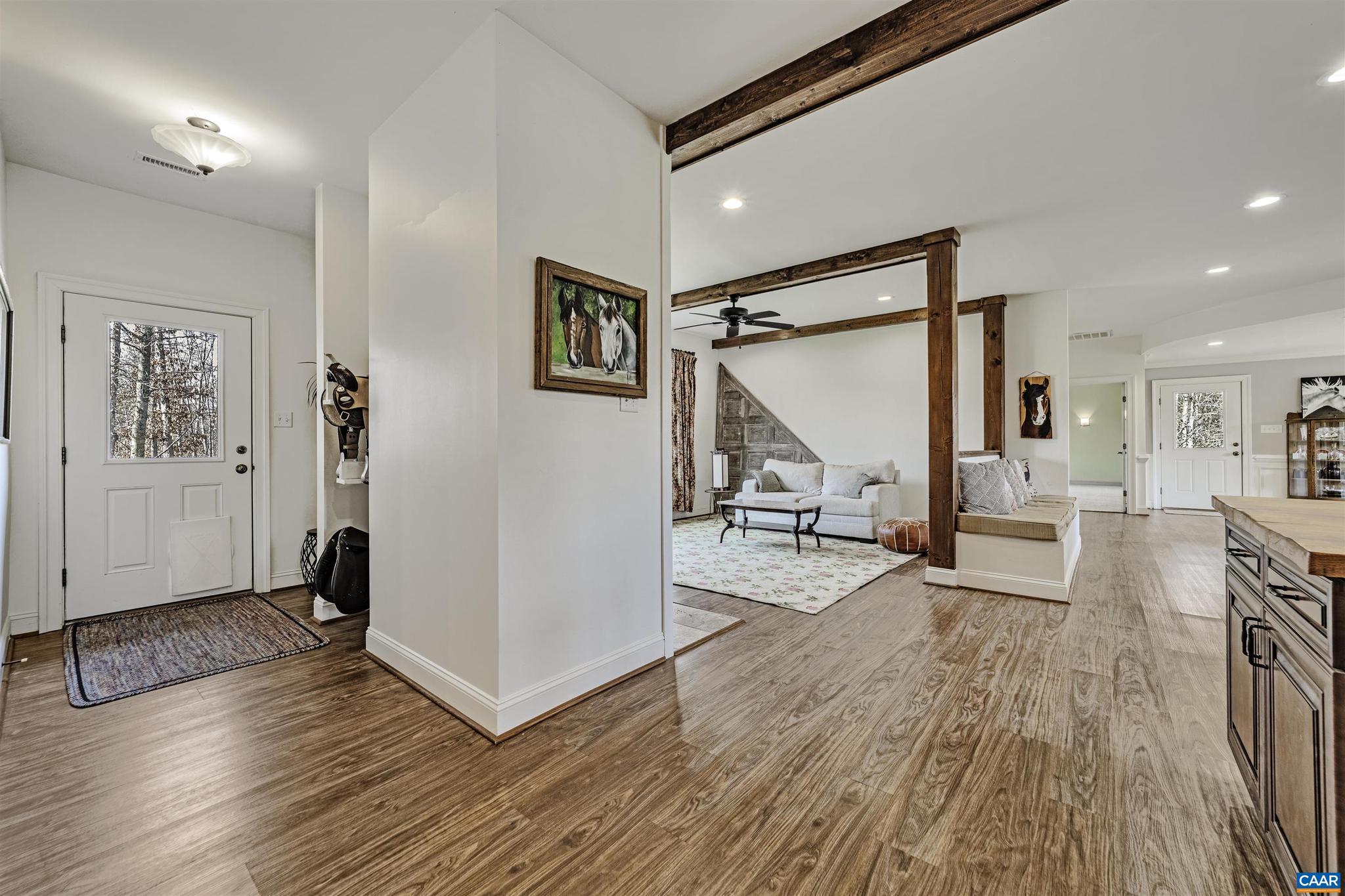 4337 Riddles Bridge Road Goochland, VA 23063 - Photo 11 of 43 a view of a livingroom with wooden floor and furniture