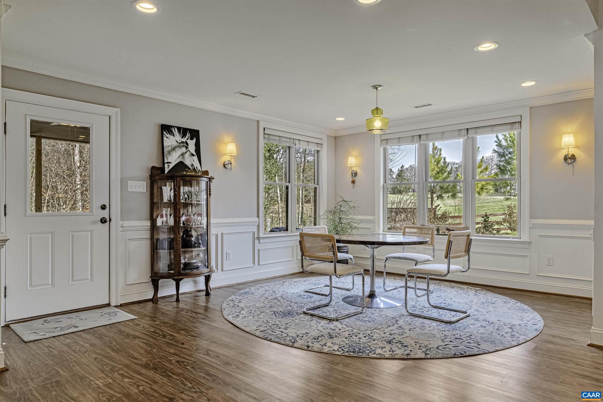 4337 Riddles Bridge Road Goochland, VA 23063 - Photo 14 of 43 a view of a livingroom with furniture window and wooden floor