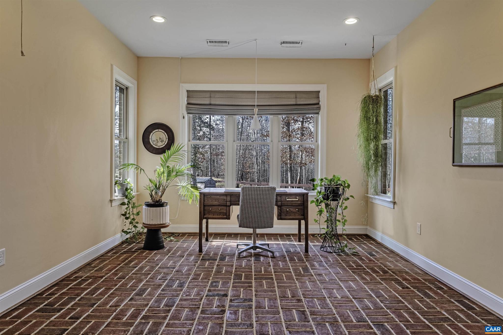 4337 Riddles Bridge Road Goochland, VA 23063 - Photo 15 of 43 a living room with furniture and a window