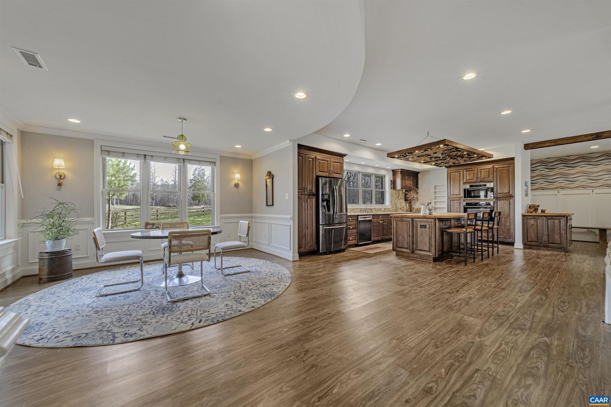 4337 Riddles Bridge Road Goochland, VA 23063 - Photo 17 of 43 a living room with furniture and a table