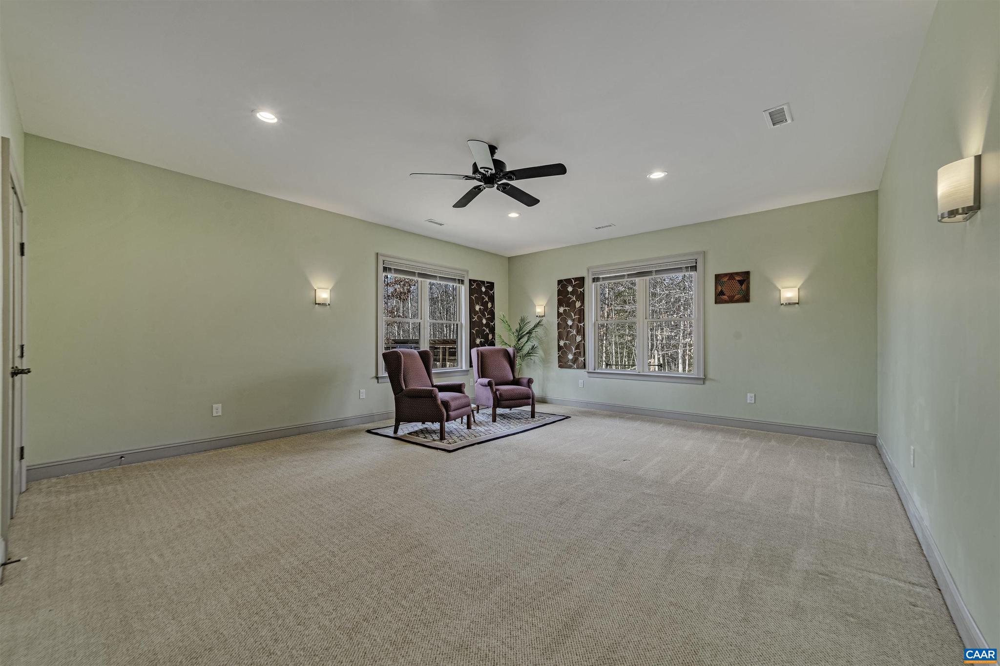 4337 Riddles Bridge Road Goochland, VA 23063 - Photo 19 of 43 a view of a livingroom with furniture and a ceiling fan