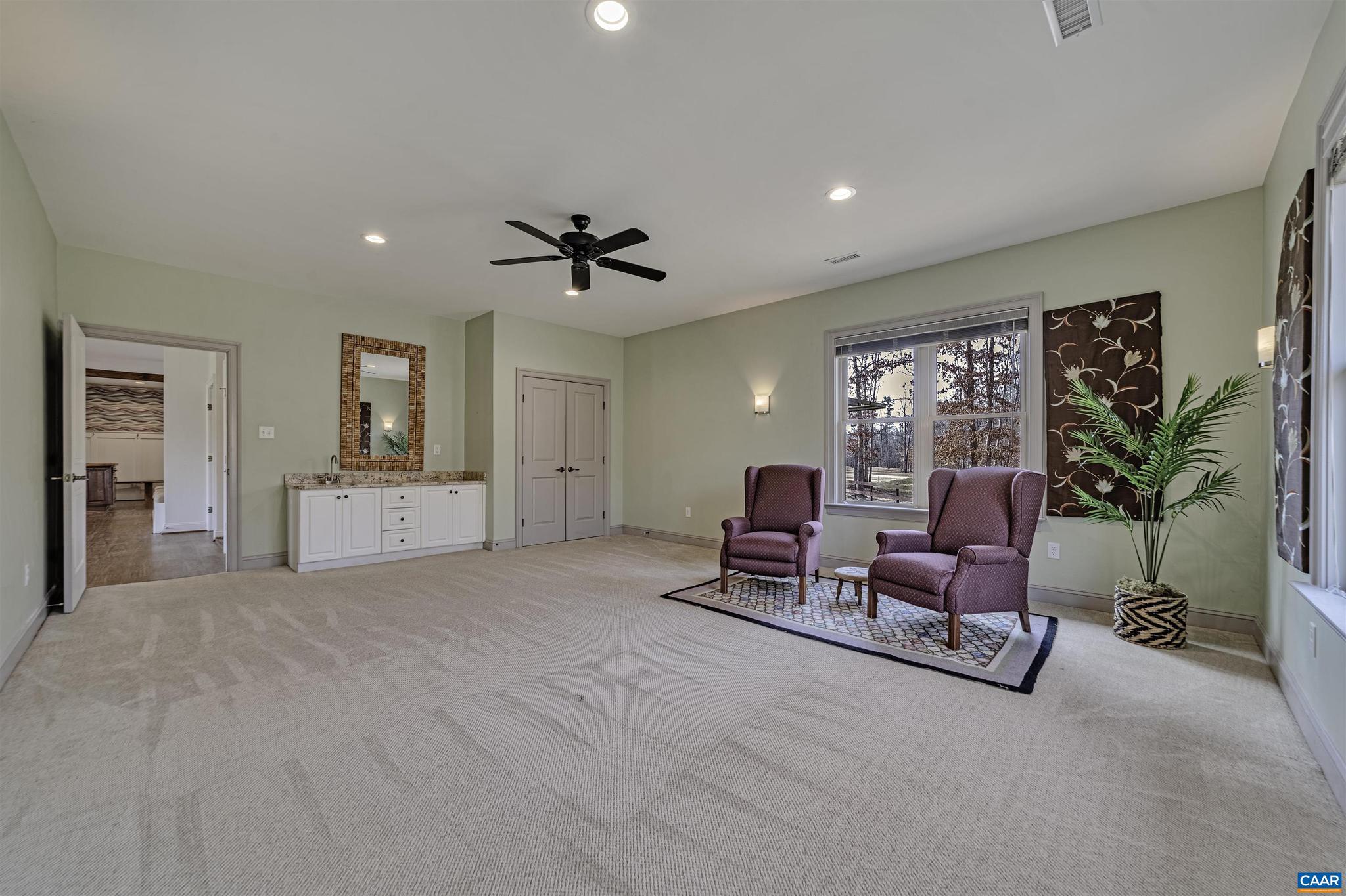 4337 Riddles Bridge Road Goochland, VA 23063 - Photo 20 of 43 a living room with furniture and a table