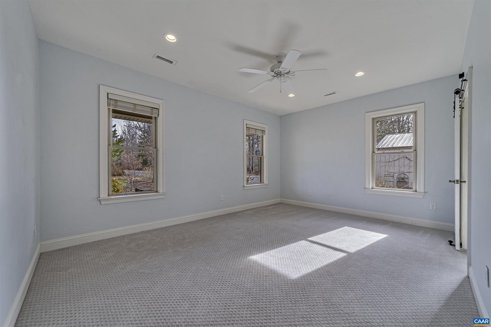 4337 Riddles Bridge Road Goochland, VA 23063 - Photo 26 of 43 an empty room with windows and closet
