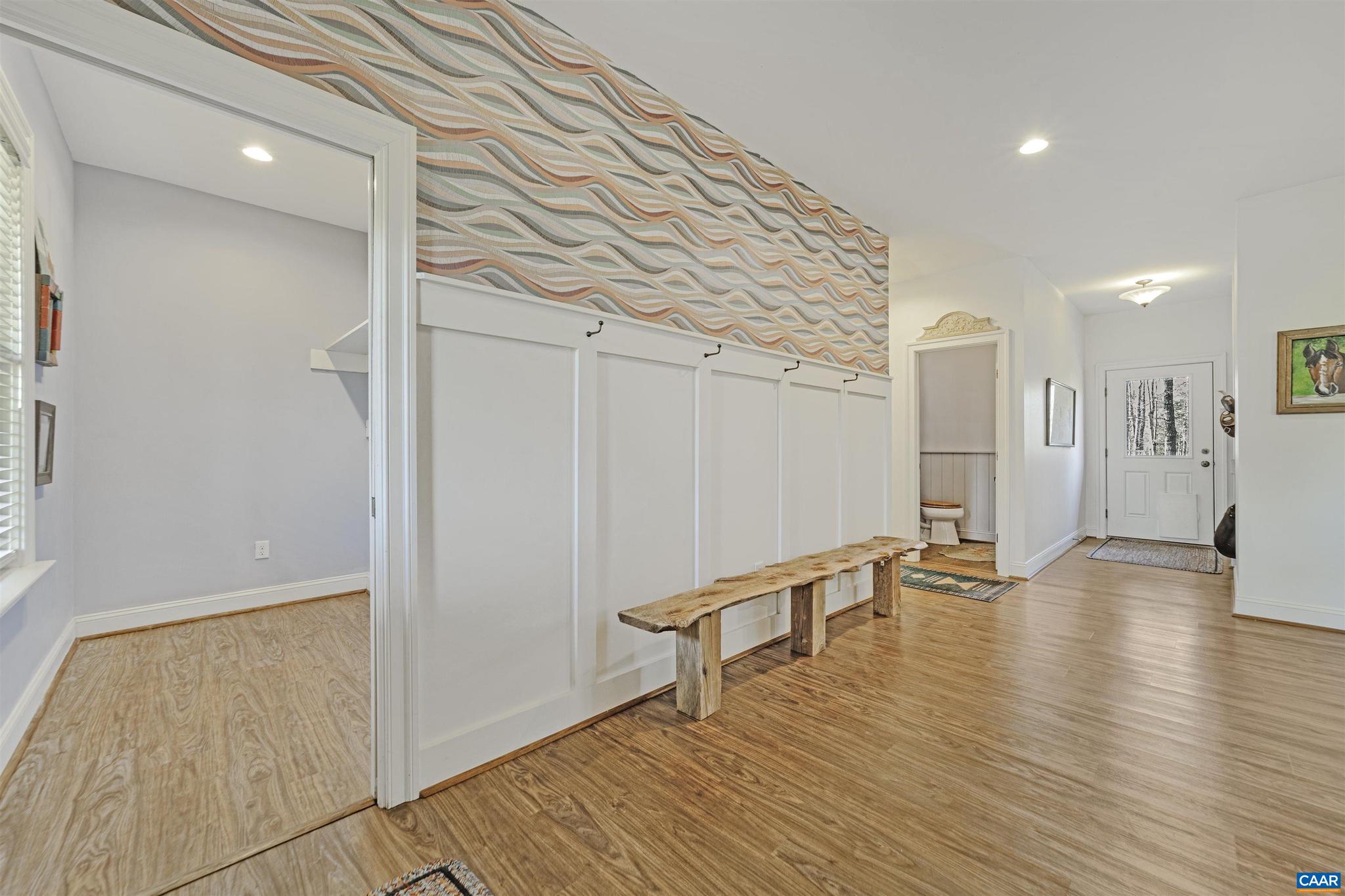 4337 Riddles Bridge Road Goochland, VA 23063 - Photo 4 of 43 a view of an empty room with wooden floor