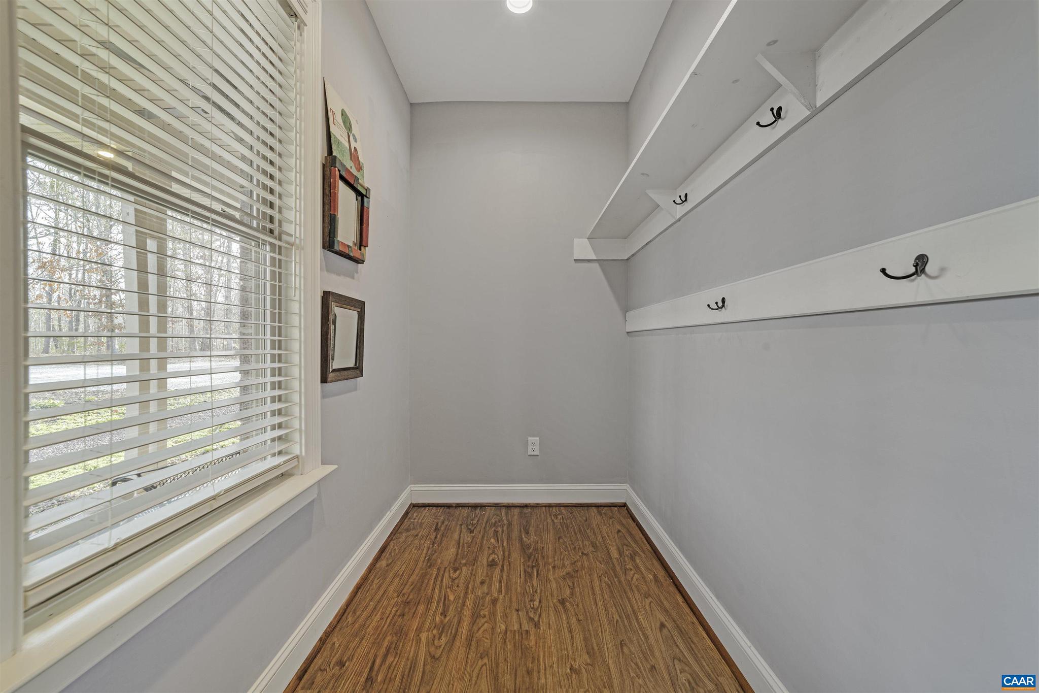 4337 Riddles Bridge Road Goochland, VA 23063 - Photo 9 of 43 a view of a room with wooden floor and a window