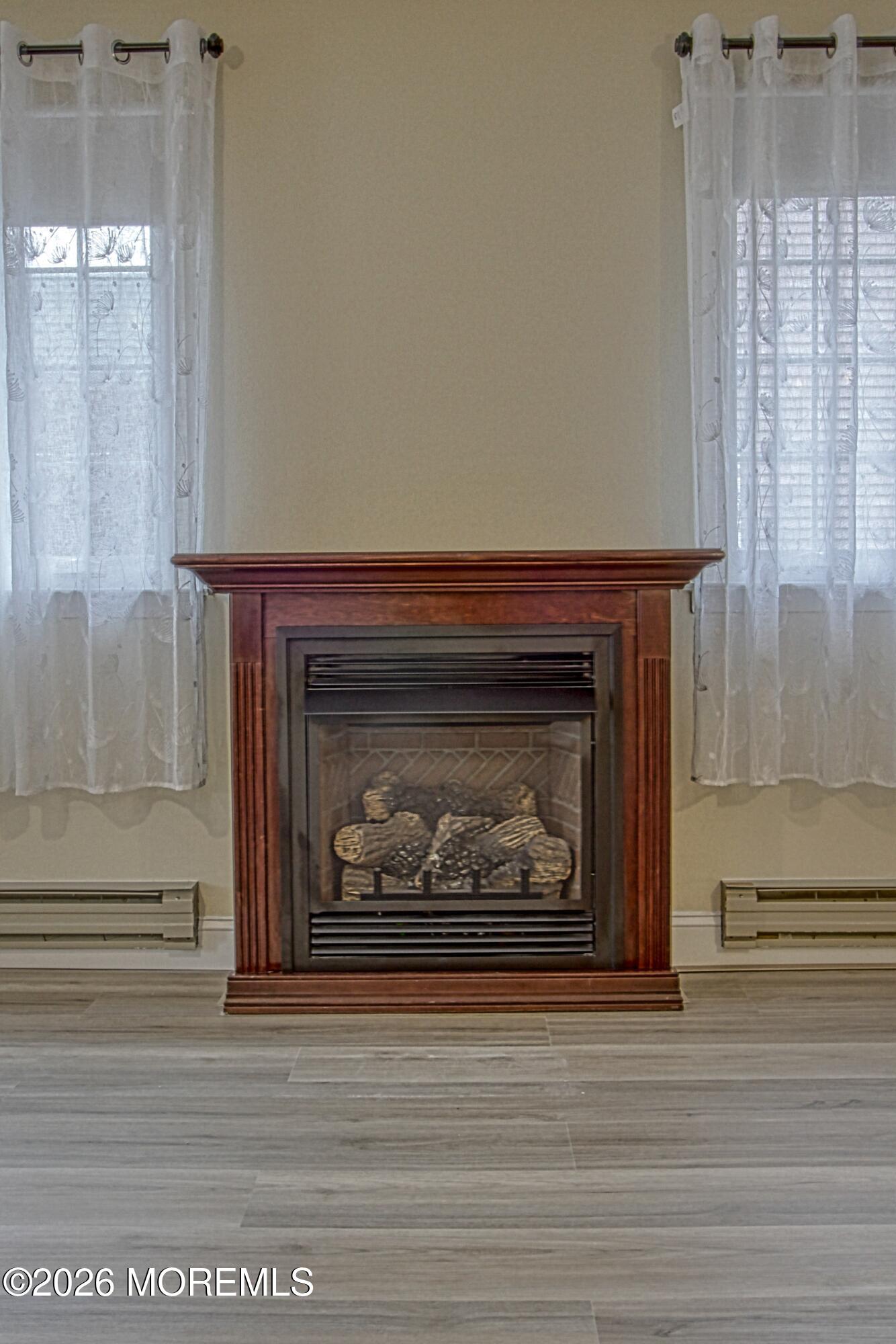 111 Sunset Road, Unit 60 Whiting, NJ 08759 - Photo 19 of 23 a close view of a fireplace in room