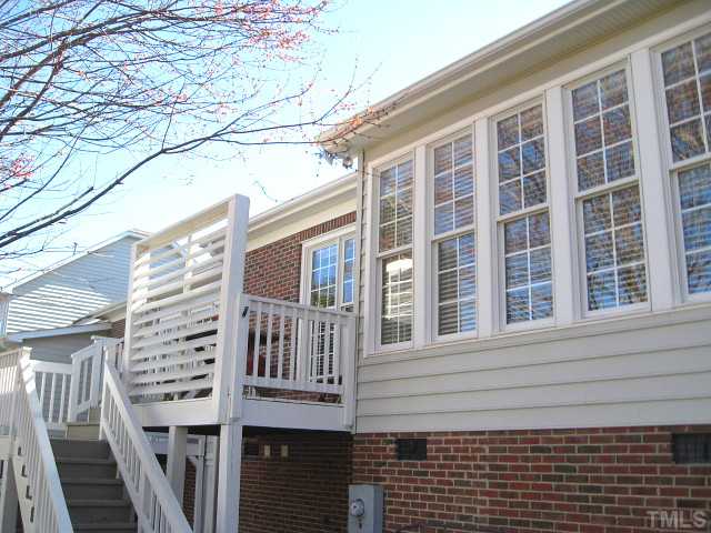 3426 Barron Berkeley Way Raleigh, NC 27612 - Photo 14 of 14 View of back showing sunroom & deck