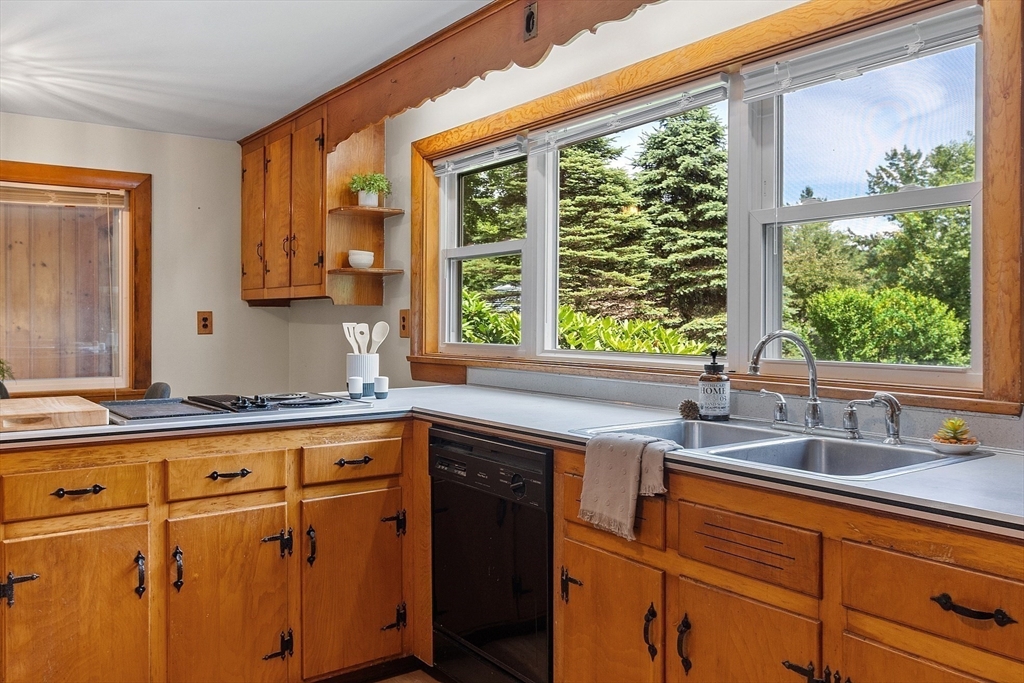35 Philip Road Athol, MA 01331 - Photo 13 of 37 a kitchen with stainless steel appliances white cabinets a sink and a large window