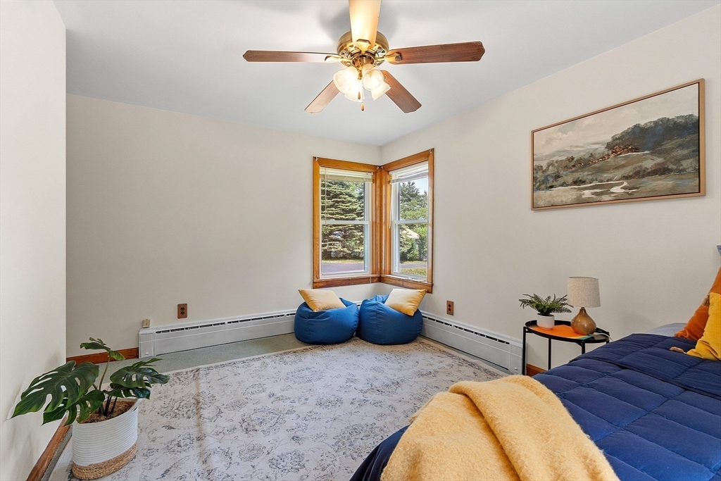 35 Philip Road Athol, MA 01331 - Photo 19 of 37 a living room with furniture and a potted plant