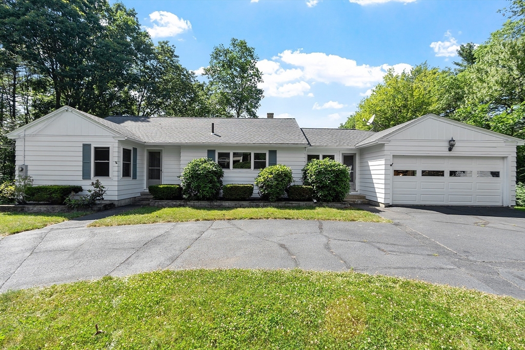 35 Philip Road Athol, MA 01331 - Photo 2 of 37 a front view of a house with a yard and garage