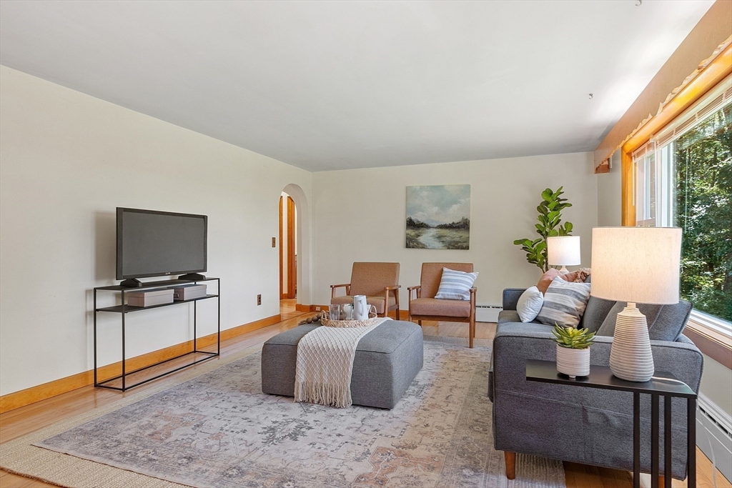 35 Philip Road Athol, MA 01331 - Photo 9 of 37 a bedroom with furniture and a flat screen tv