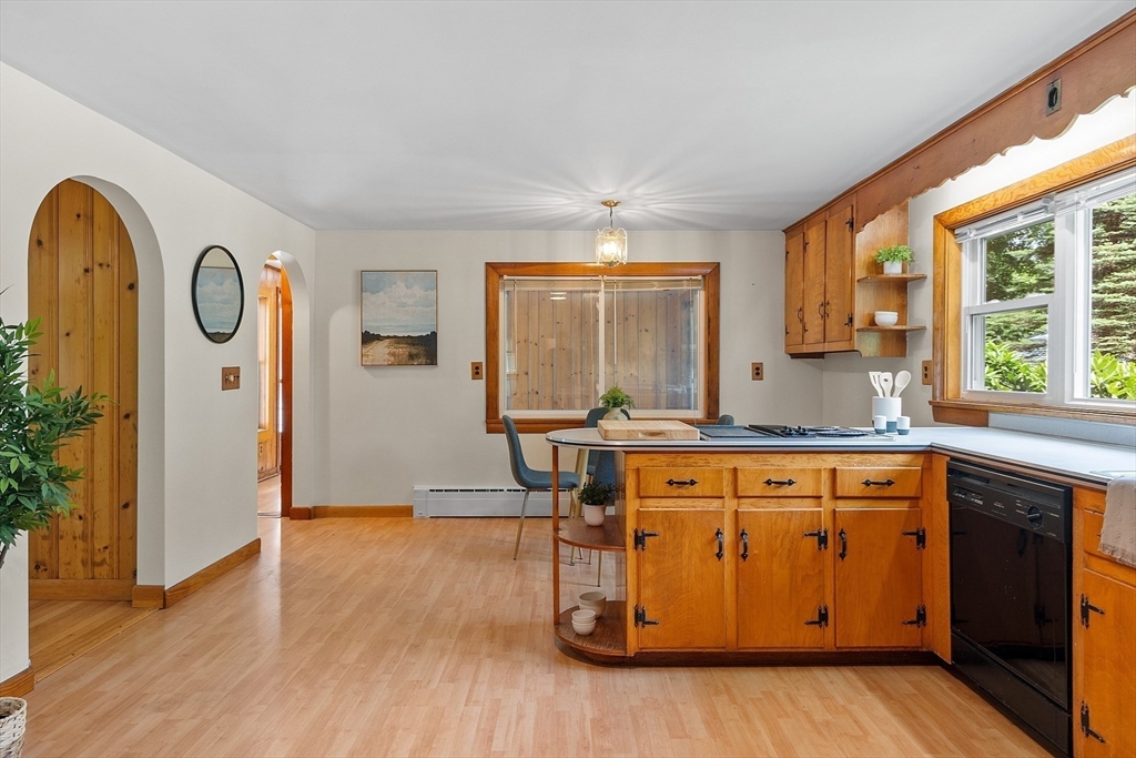 35 Philip Road Athol, MA 01331 - Photo 10 of 37 a kitchen with stainless steel appliances granite countertop a stove a sink dishwasher and a refrigerator with wooden floor
