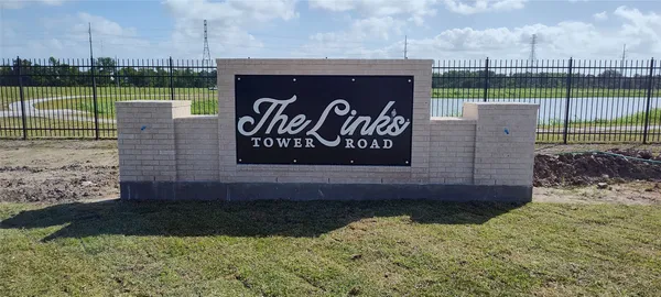 a view of a park with welcome board