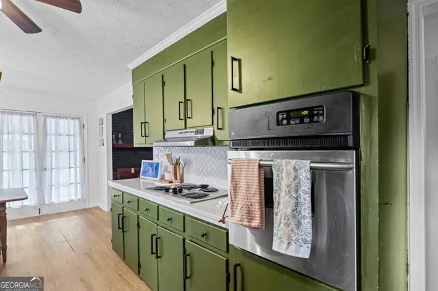 a bedroom with a bed and a book shelf