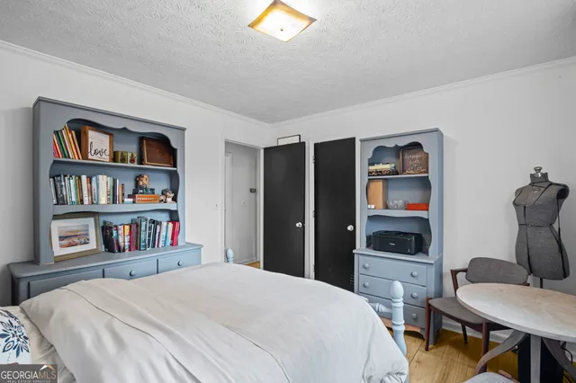 a view of house with backyard and pool