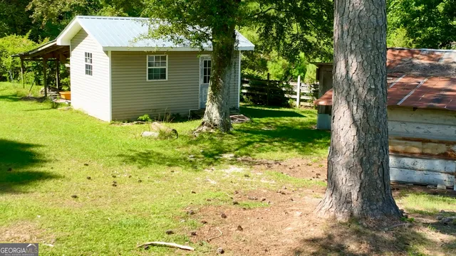 a view of a garden with a tree