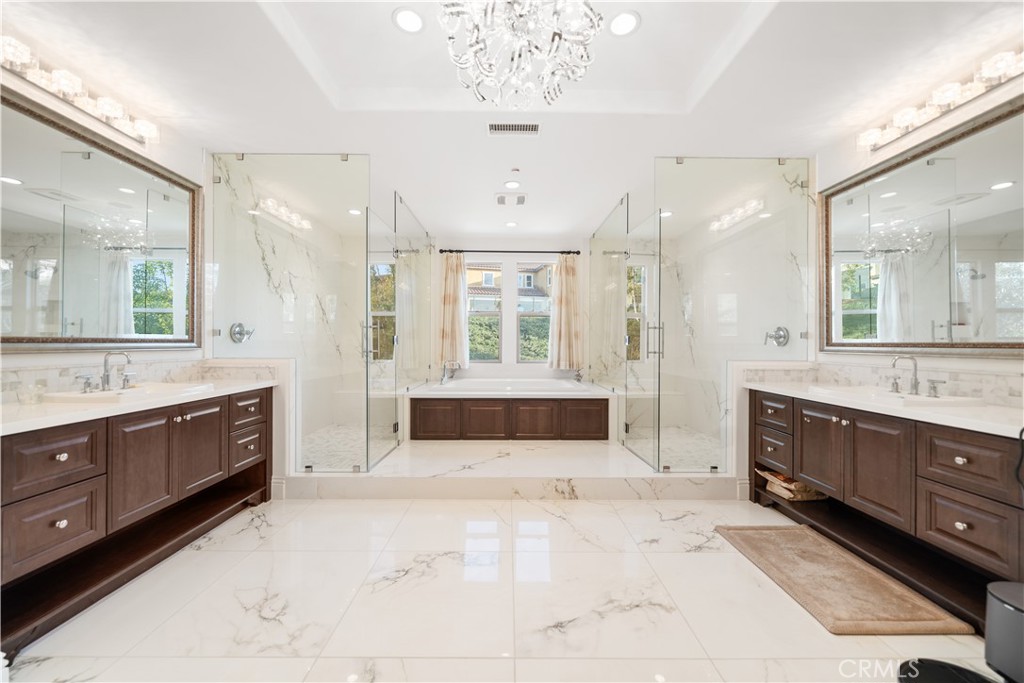 878 North Landa Way Brea, CA 92821 - Photo 30 of 52 a large en suite bathroom with a tub sink and mirror