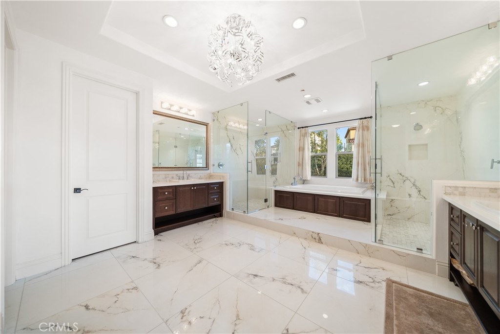 878 North Landa Way Brea, CA 92821 - Photo 31 of 52 a bathroom with a double vanity sink and a mirror