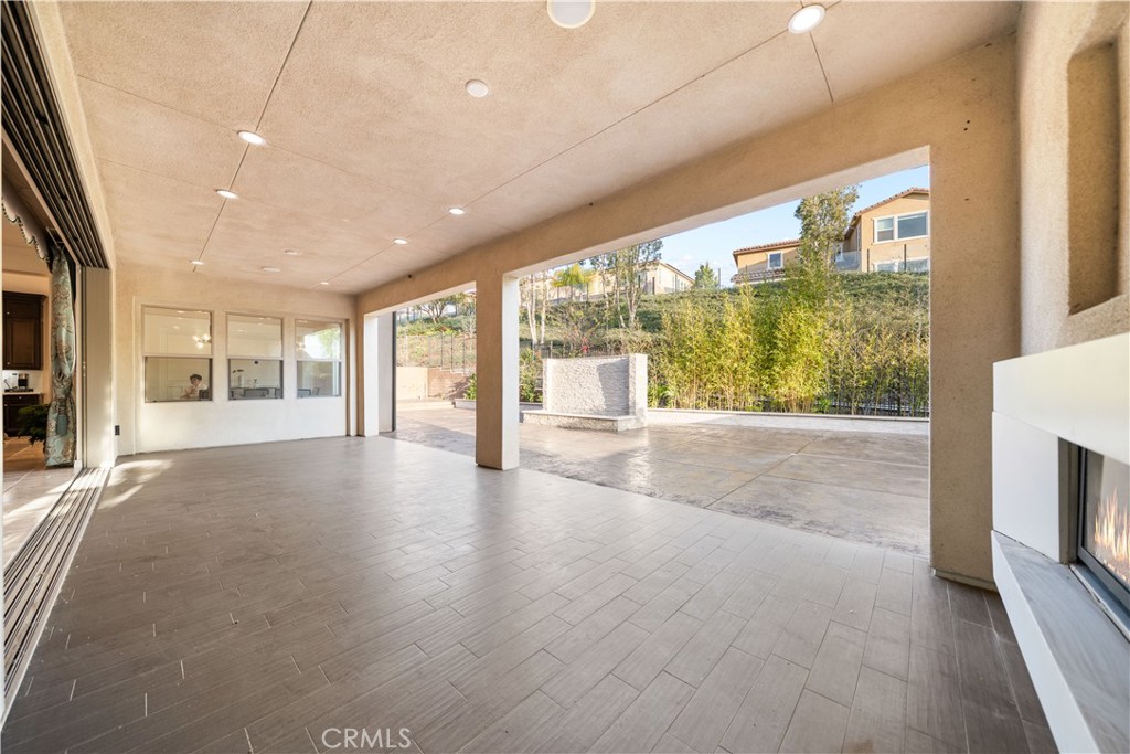 878 North Landa Way Brea, CA 92821 - Photo 44 of 52 a view of an empty room with wooden floor and a window
