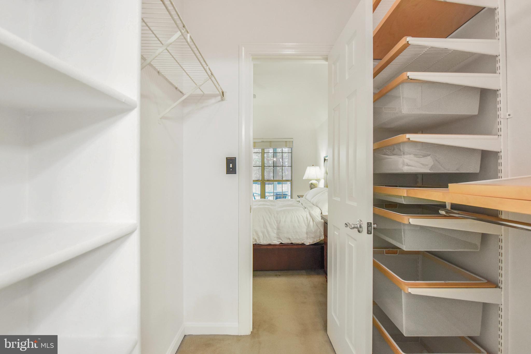 3909 Penderview Drive, Unit 1923 Fairfax, VA 22033 - Photo 13 of 19 a walk in closet with view of bedroom